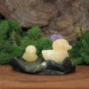 Jade with Orange Calcite Ducks